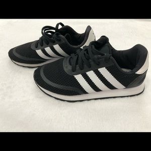 Black and white Addidas shoes